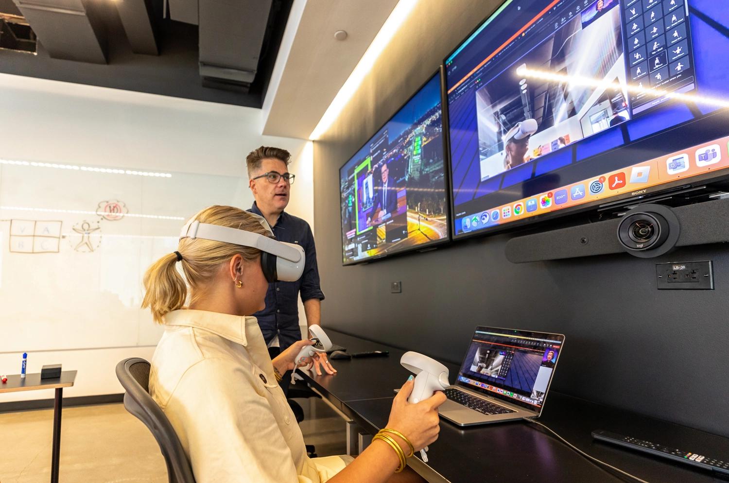 Woman using a VR headset in the TRG Innovation Lab