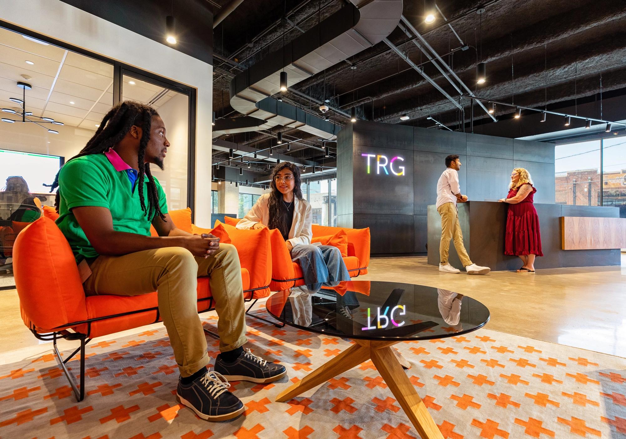 TRG lobby shot with people talking