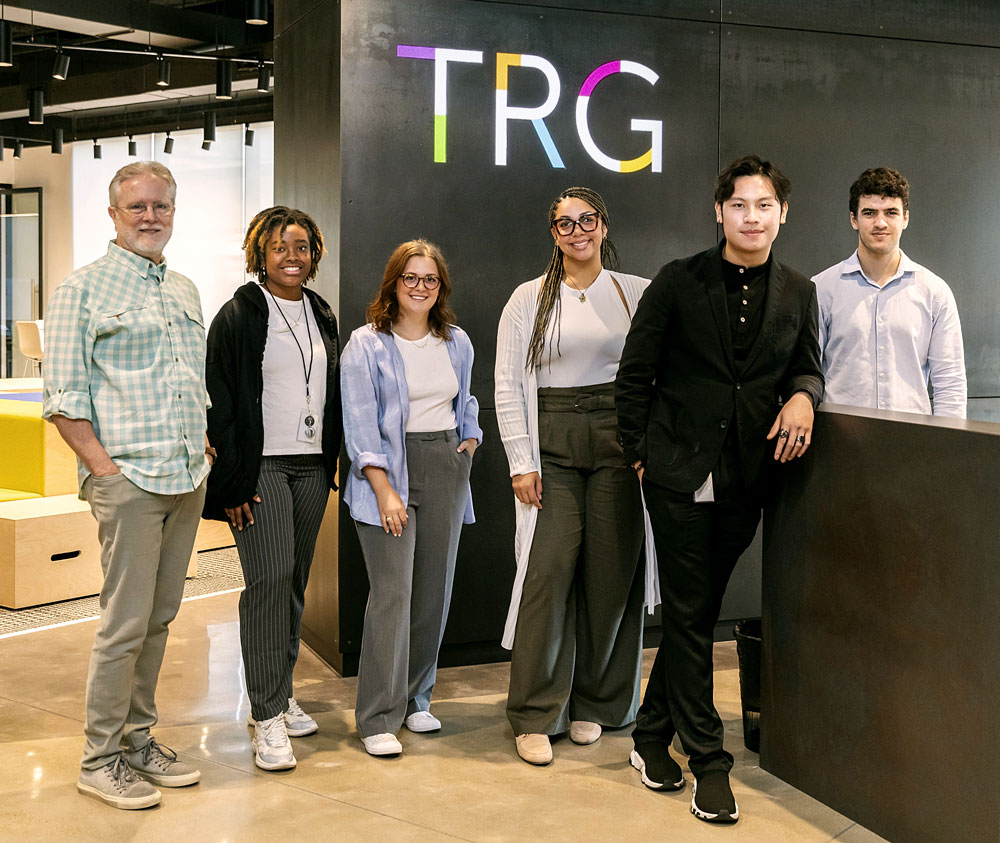 Team with TRG sign